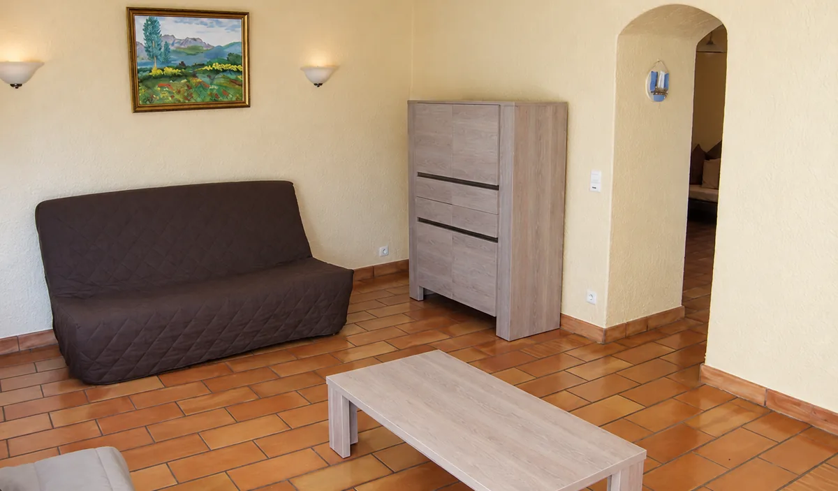 Le salon et son canapé — Villa Provençale, Camping Les Philippons